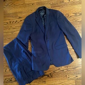 Great condition Mens navy suit Egara “extreme slim fit” style. 38L jacket. 32